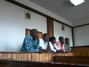 The journalists appearing in court at Buganda Road